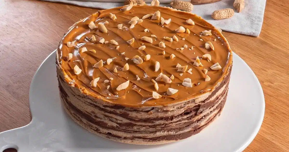 This Crepe Cake with Mascarpone Peanut Cream and Chocolate Ganache is Totally Addictive!