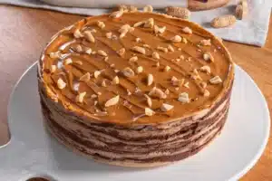 This Crepe Cake with Mascarpone Peanut Cream and Chocolate Ganache is Totally Addictive!